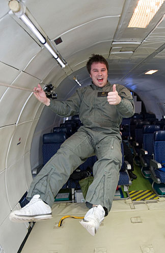 UT bioengineering student Kyle Killam gave a thumb’s up while riding in NASA’s “Vomit Comet.”