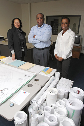 Dr. Shanda Gore, left, Tom Bebley and Felissa Parker-Green met recently in the Minority Business Development Center.