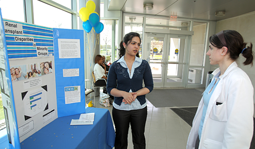 Mehnoor Durrani, a senior at Notre Dame Academy, talked with a medical student about her poster titled “Renal Transplant Disparities in Minority Groups.” Durrani took first place in the Toledo Starz Program’s symposium.