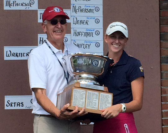 Senior Jennifer Elsholz received the trophy for winning the 98th annual Michigan Women’s Golf Amateur title.