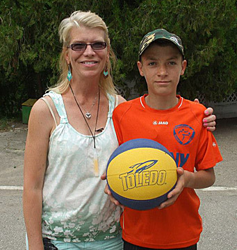 Shari Grayczyk and a youth at the camp smiled for the camera in Moldova.