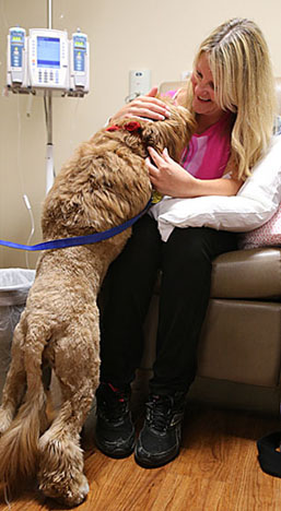 Porshia greeted patient Tricia Maassel, who was happy to see her four-legged friend.