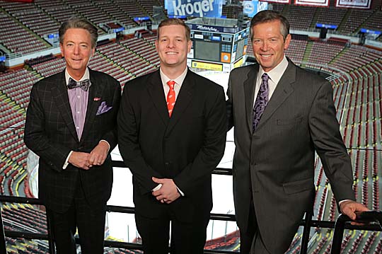 Lawrence Burns, UT vice president for external affairs, left, posed for a photo with Ryan Carlson, customer relationship manager and marketing analyst for the Detroit Red Wings, center, and Tom Wilson, president and CEO of Olympia Entertainment, at Joe Louis Arena Nov. 21 when it was announced the University and the team extended their partnership.