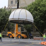 A crane removed the dome of the Brooks Observatory last week and workers helped guide the structure to the ground.