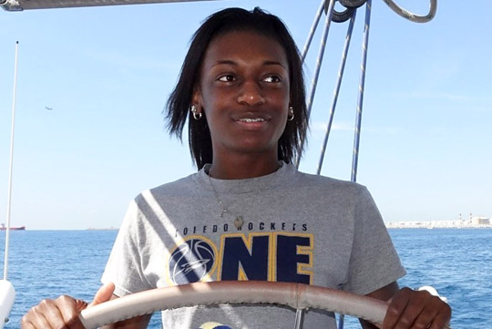Mikaela Boyd had the chance to steer the catamaran Sunday off the coast of Barcelona.