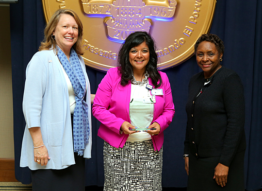 Lisa Akeman received the Diane Hymore Exemplar of Excellence Award from President Sharon L. Gaber, left, and Jovita Thomas-Williams, vice president and chief HR officer for human resources and talent development.  