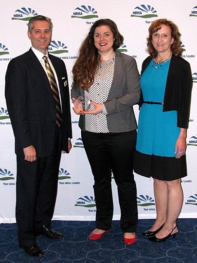 UT medical student Hallie Foster received the 2016 Student Leadership Award from the National Rural Health Association from Alan Morgan, CEO of the association, and Lisa Kilawee, president of the nonprofit group.