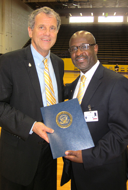 U.S. Sen. Sherrod Brown, left, and Dr. Willie McKether, UT vice president for diversity and inclusion, posed for a photo at the My Brother’s Keeper kickoff event at Waite High School.