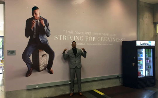 Tyrone Jacobs Jr. posed for a photo last month by his mural at LinkedIn headquarters in Mountain View, Calif.