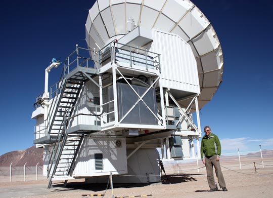 Dr. Tom Megeath, shown here with the APEX telescope at an altitude of 16,750 feet on the Llano de Chajnantor in the Atacama Desert in Chile, has been selected to serve a three-year term as a member of the Executive Committee for NASA’s Cosmic Origins Program Analysis Group.