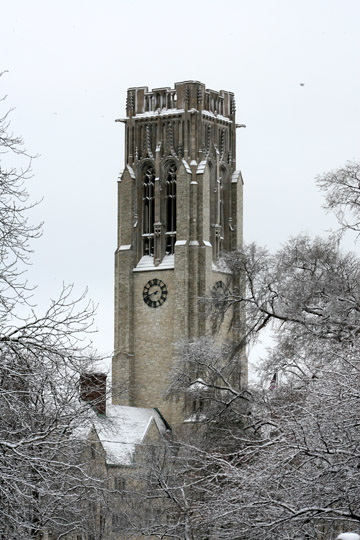 Snowy winter pictures of main campus University Hall clock tower