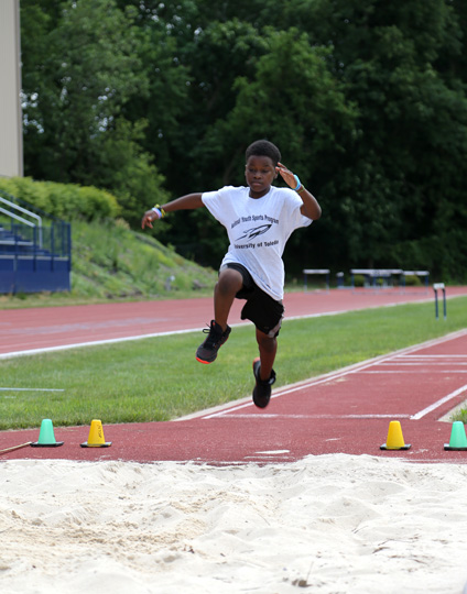 Kids Long Jump Photos, Images and Pictures