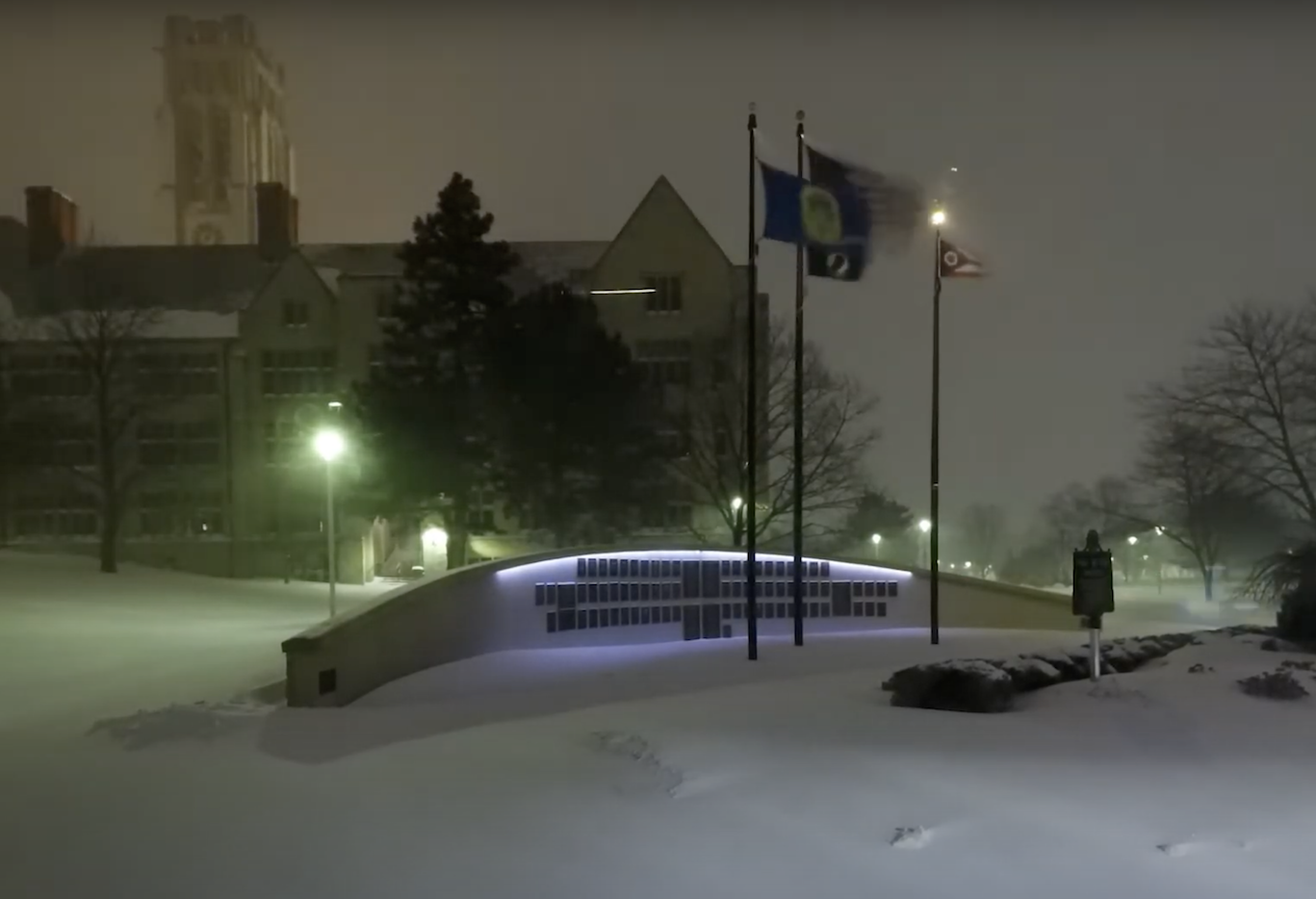 Snowfall on campus near Field House