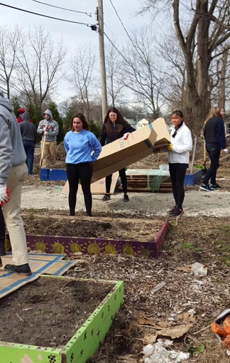 Alpha Xi Delta and Pi Kappa Alpha, a social sorority and fraternity, teamed up to clean up a local garden for this year's Big Event.