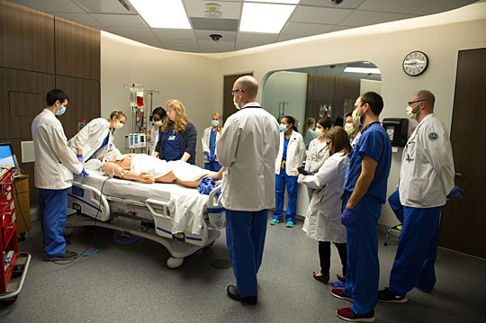 Third-year medical student Nathan Marcinkowski led the team in a state-of-the-art medical simulation suite, which served as the ER for the heroin overdose exercise.