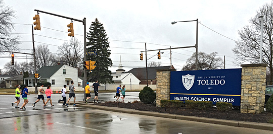 Students in the College of Medicine and Life Sciences recently went for a run with their dean, Dr. Christopher Cooper, sporting a yellow T-shirt and blue hat. 