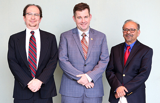 Receiving Outstanding Researcher Awards are, from left, Dr. Joseph Slater, Geoffrey Rapp and Dr. Sarit Bhaduri.