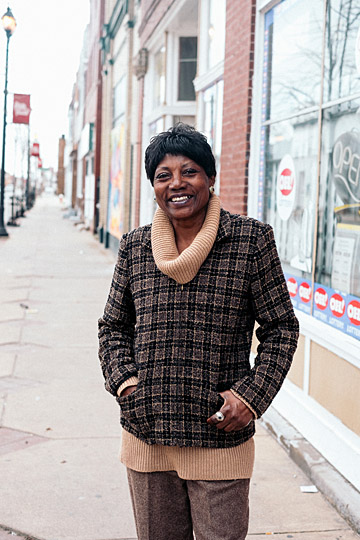 Christie, a local garden owner, was photographed in front of Tom’s Carryout on Lagrange Street by Lucas Sigurdson.