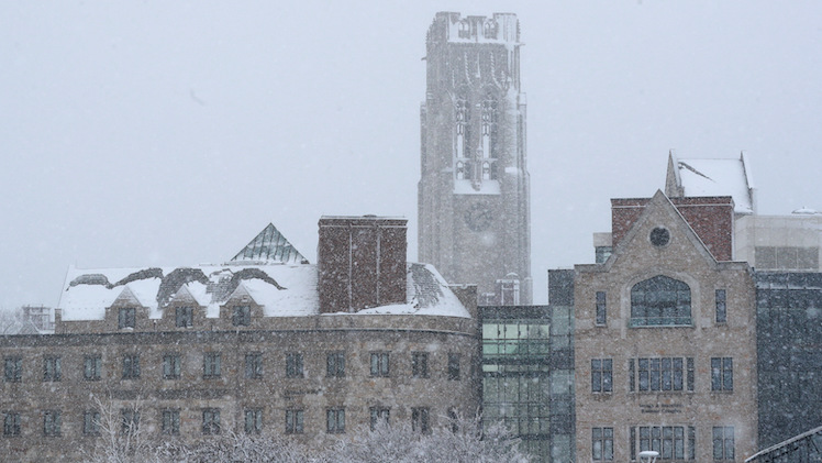 University Hall while snow falls on January 25
