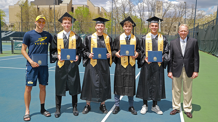 UToledo President Gregory Postel presented diplomas to five senior class members of the Toledo men's tennis team who will be competing in the NCAA tournament at the same time as commencement ceremonies. Postel recognized, from left, Marko Galic, Krzysztof Wetoszka, Luka Jankovic, Max Skaer and Luis Kleinschnitz.