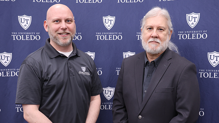 Recipients of the Outstanding Advisor Award are, from left, Dale Pelz Jr., the assistant director of student services in the College of Nursing, and Dr. Wesley Bullock, an associate Professor in the Department of Psychology in the College of Arts and Letters.