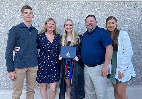UToledo graduating student Michael Kruszka poses with his wife and their three adult children. 