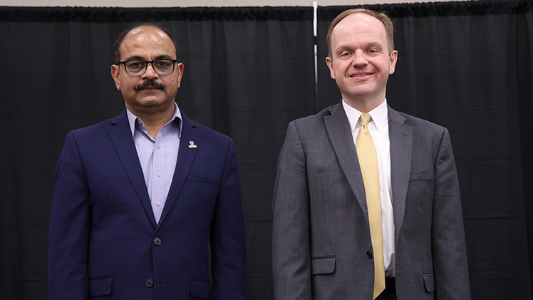 Recipients of the Outstanding Research and Scholarship Award, from left, Dr. Matam Vijay-Kumar, a professor in the Department of Physiology-Pharmacology in the College of Medicine and Life Sciences, and Eric Chaffee, a professor of law in the College of Law.