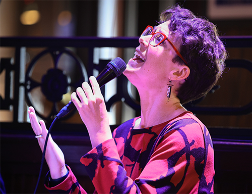 Jazz singer Ellie Martin sings during a club concert.