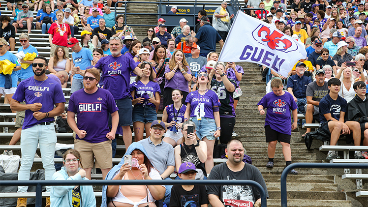A photo of fans of the Italian Football team Guelfi Firenze in the stands during the Italian Bowl at UToledo's Glass Bowl.