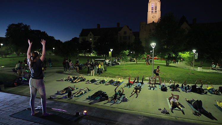 Photo of yoga under the stars at the Light Up the Night event 2022.