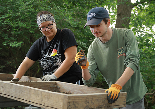 Geena Clarke, left, a senior from Toledo, and Nicholas McKarus, right, a junior from Sylvania,