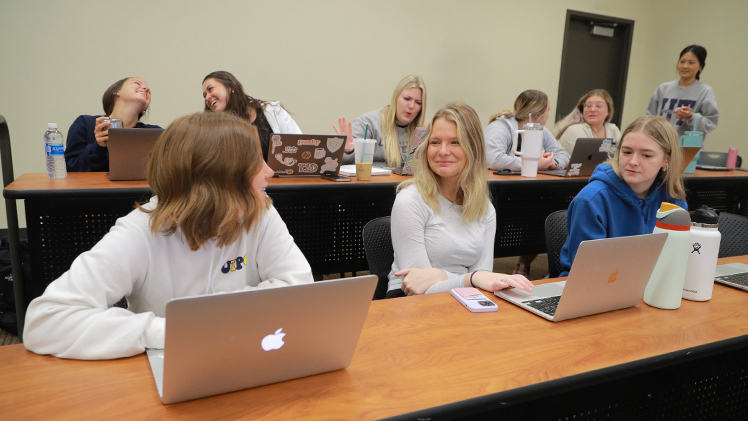 senior nursing students Gabrielle Graham, Emily Herman and Kailey Nieman in the Population Health course.