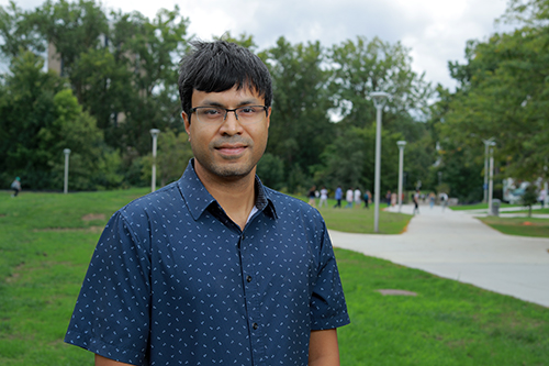 Dr. Aniruddha Ray, an assistant professor in the Department of Physics and Astronomy, poses outside for a feature photo on the UToledo Main Campus.