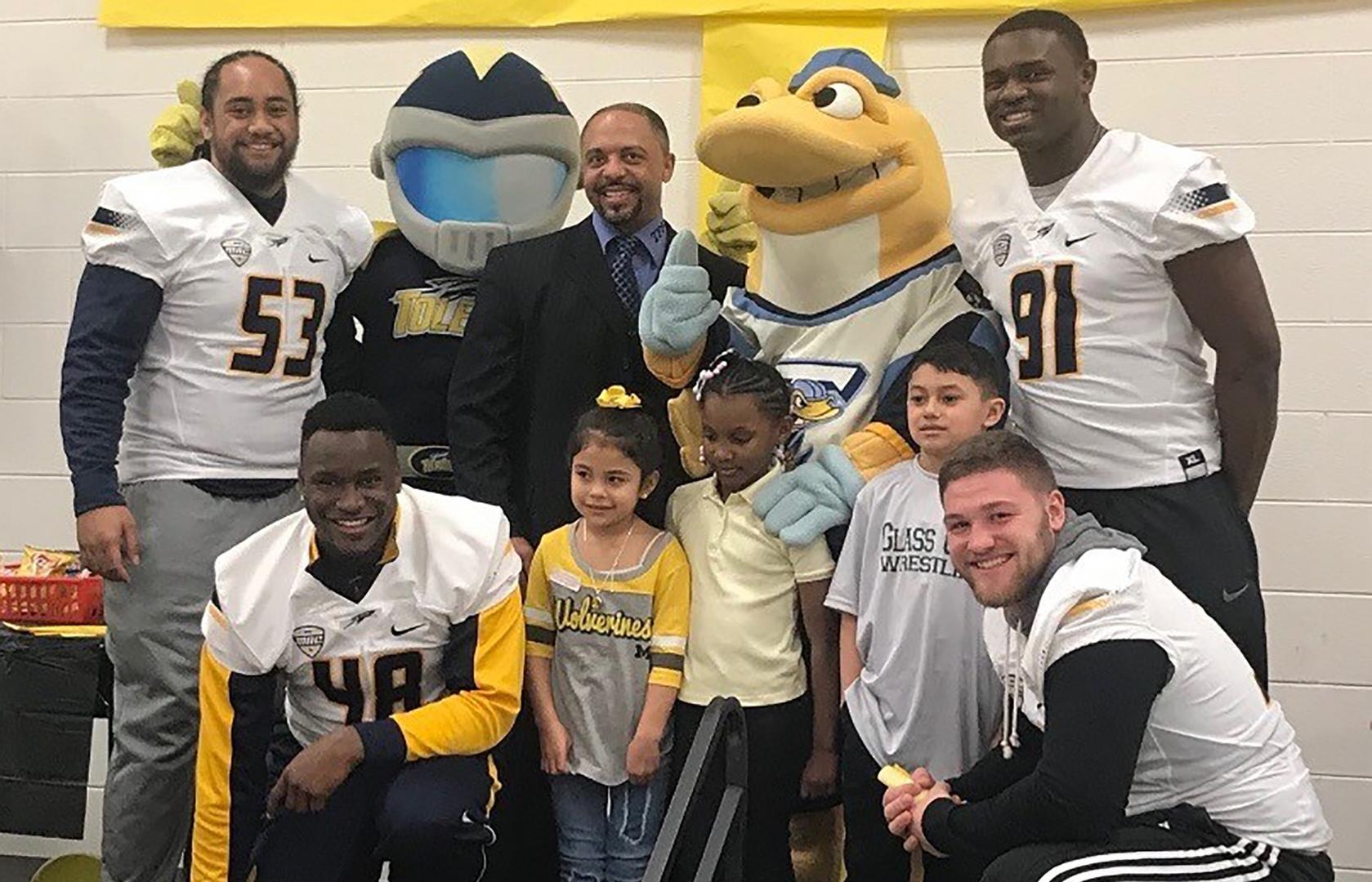 Bolden (lower right) is a two-time nominee for the Allstate AFCA Good Works Team for his volunteer work in the Toledo community.