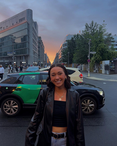 Photo of Pittman, who is scheduled to graduate in May, in the city of Berlin at sunset.