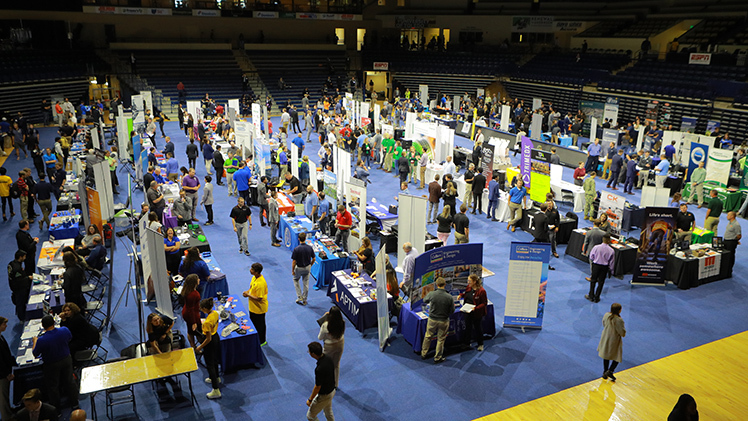 Photo of students and alumni from the College of Engineering at UToledo’s Fall 2023 Engineering Career Expo in Savage Arena.