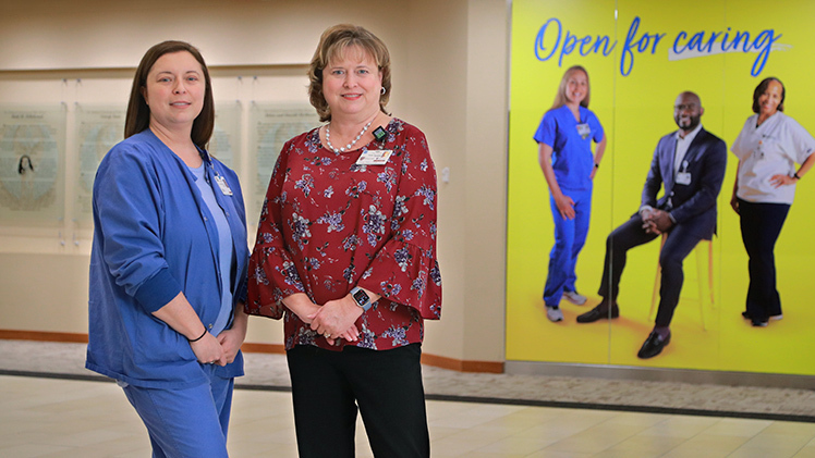 Sisters Bethany Liedel, left, and Tracy Pakulski, who both suffer from polycystic kidney disease, are among the featured speakers at a celebration today recognizing UTMC’s 3,000th kidney transplant.