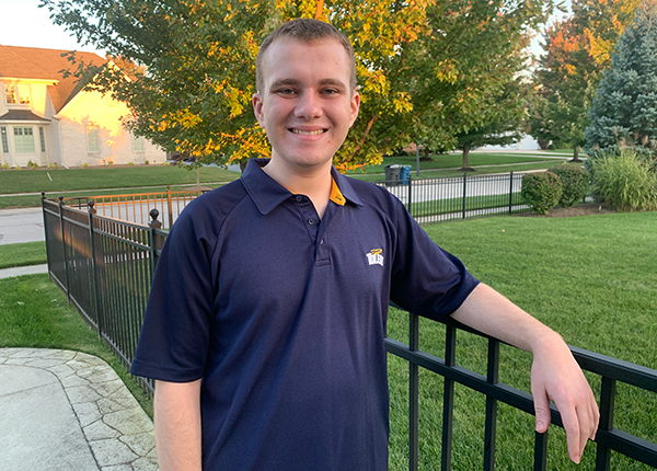 Outside photo of Aaron Dickman, a junior at UToledo majoring in accounting and minoring in data analytics.