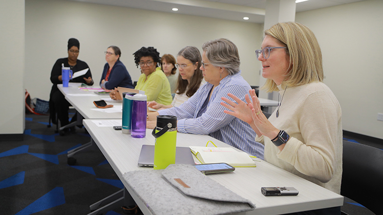 Dr. Kate Delaney, an associate professor in the Department of Education, leads a community-partner meeting on Literacy Everywhere, a UToledo-led initiative to support early literacy in families experiencing housing instability.