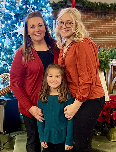Photo of Bryna Benninghoff, who is pursuing master of science degree in nursing, and her two daughters.