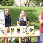 Photo of Lisa Kaiser, who served as president of the The University of Toledo Engineering Council for two semesters, at an outside tabling event for the student org.