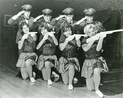 Members of the Dancing Rock-ets pose with U.S. soldiers during their 1965 European tour in this Throwback Thursday photo from the Ward M. Canaday Center for Special Collections.