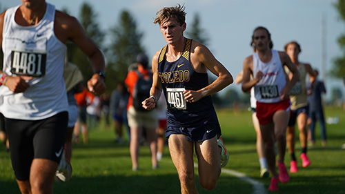 Photo of Xavier Gallo, a member of The University of Toledo's men's cross country team, during a meet.