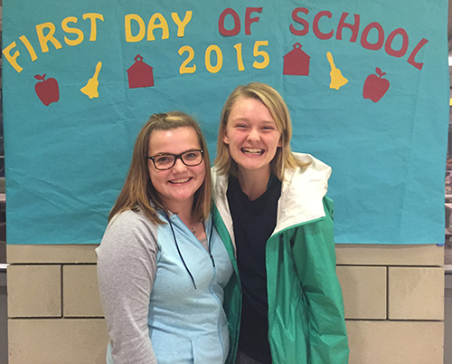 Emily Cohoe, left, poses with a friend as they began their freshman year of college.