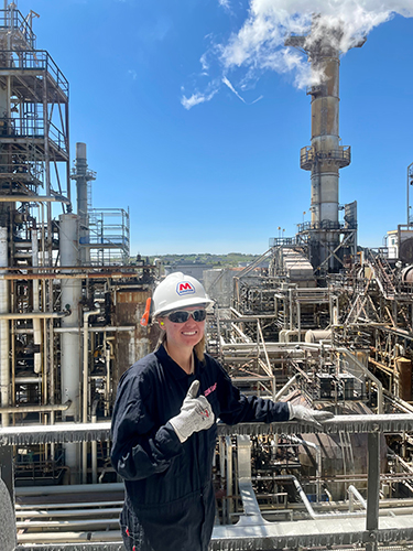 Skyler Parker poses at Marathon Petroleum refinery. She had five internships with Marathon Petroleum as a student, and in January will join the company’s Detroit refinery as a tech service engineer.