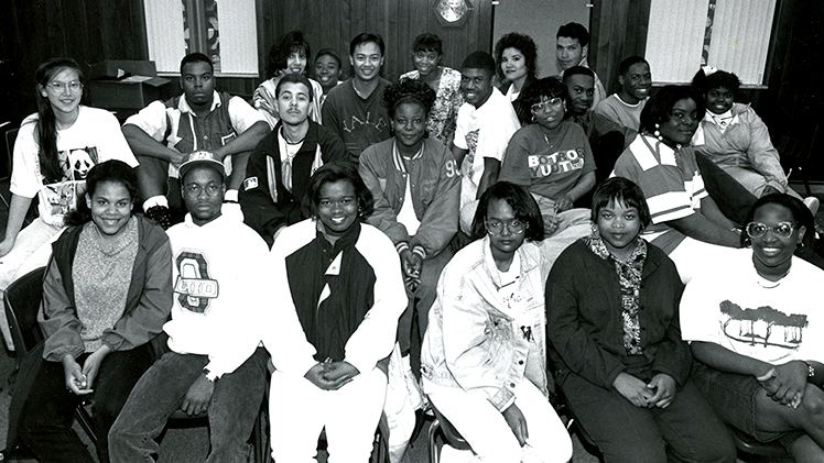 This photo is of the first class of EXCEL students graduating in 1993, having joined the program in July 1989.