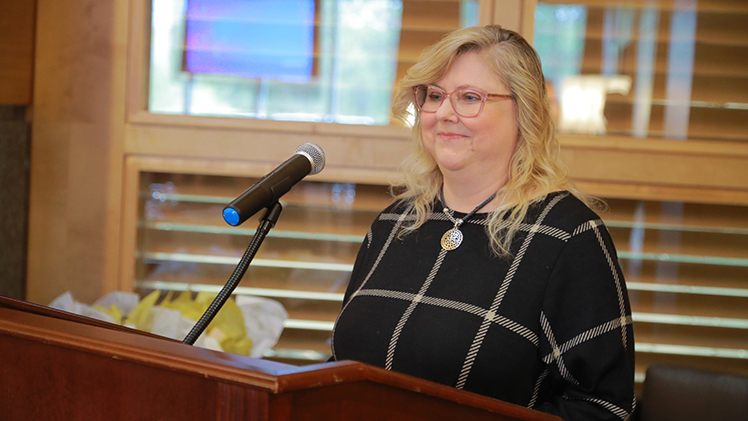 Sherry Baker, who was one of a record 203 individuals who received a kidney transplant at UTMC in 2023, speaks at an October celebration of UTMC's transplant program. Baker's procedure was the 3,000th transplant in the hospital's history.