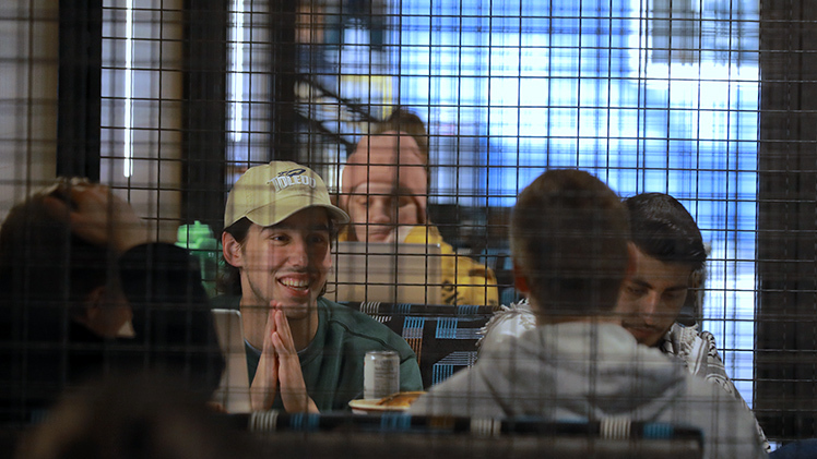 Cobey Kramer, a computer science and engineering senior, sits with his friends in the newly renovated North Engineering Building, and discuss possible projects for the Senior Design Expo on Friday, April 26.