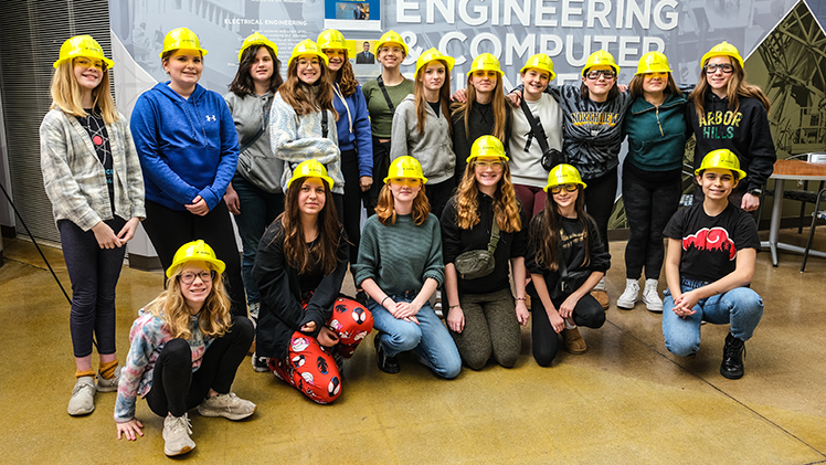 A large group of middle school girls pose for a photo during The University of Toledo College of Engineering’s award-winning Introduce a Girl to Engineering Day, which welcomed more than 300 seventh and eighth grade girls from 13 schools to campus on Friday, along with 15 companies.