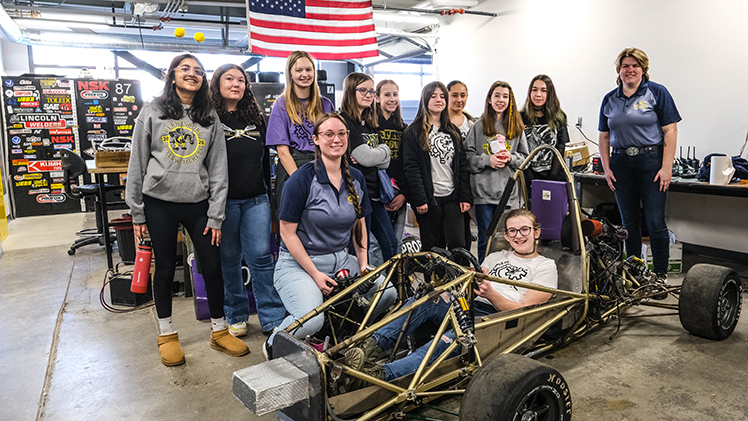 Middle school girls pose next to a go-cart as part of The University of Toledo College of Engineering’s award-winning Introduce a Girl to Engineering Day, which welcomed more than 300 seventh and eighth grade girls from 13 schools to campus on Friday, along with 15 companies.